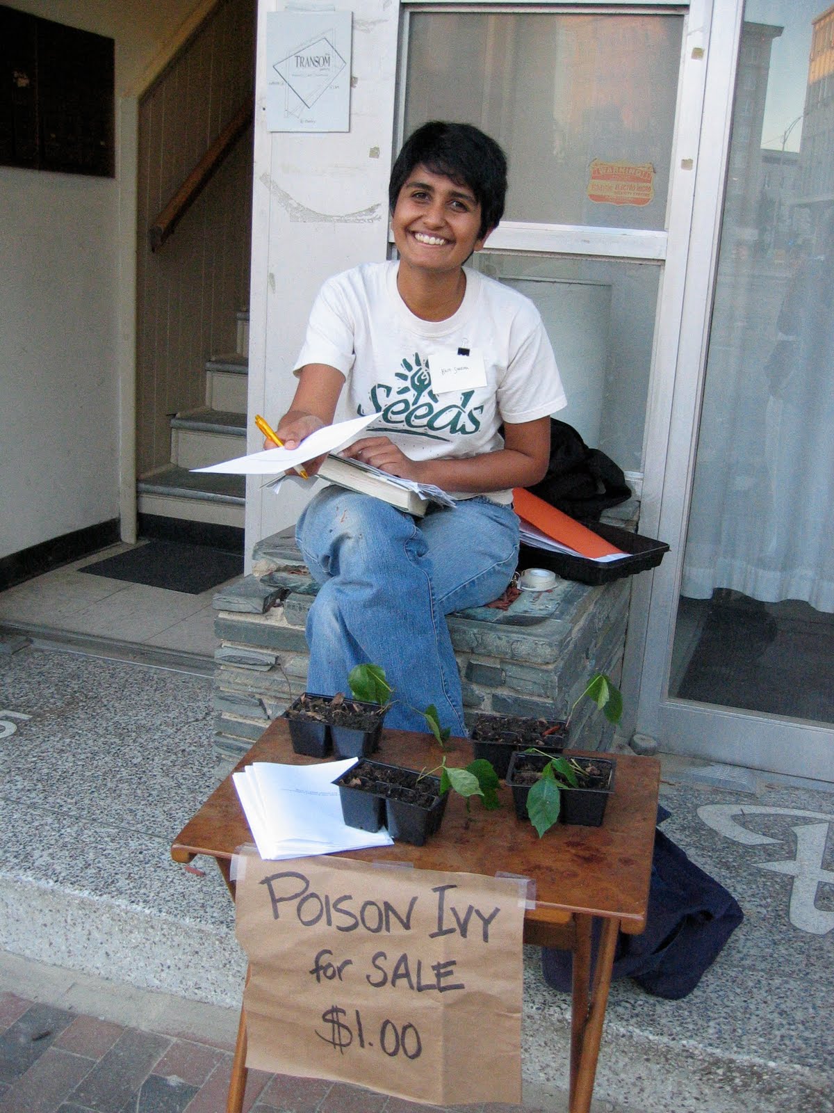 Kriti Sharma participant in the Urban Anthropology project doing performance "Poison Ivy for Sale" with self-produced "care manual"